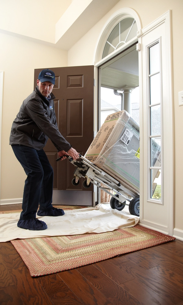 carrier tech bringing inside a unit